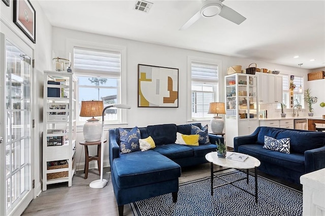 3116 Beaulieu St, Metairie, LA 70001 - living room featuring healthy amount of natural light, light wood finished floors, a ceiling fan, and recessed lighting