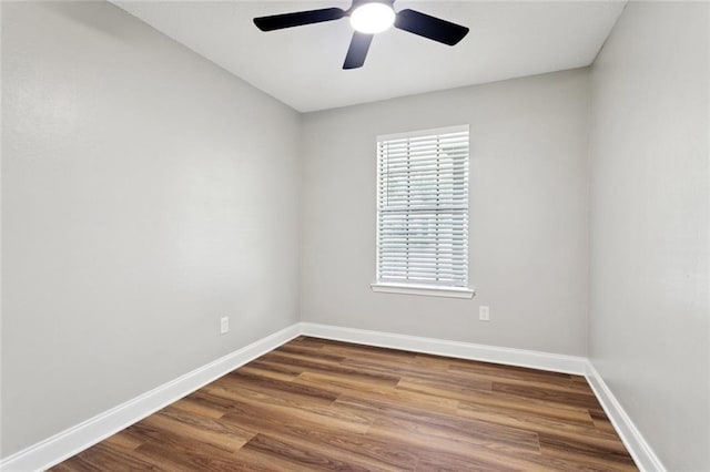 2306 Bluebird St, Slidell, LA 70460 - spare room with a ceiling fan and dark wood-style floors
