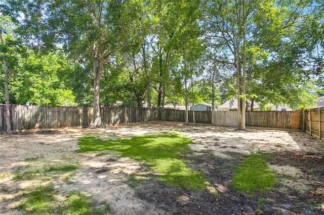2306 Bluebird St, Slidell, LA 70460 - view of fenced backyard