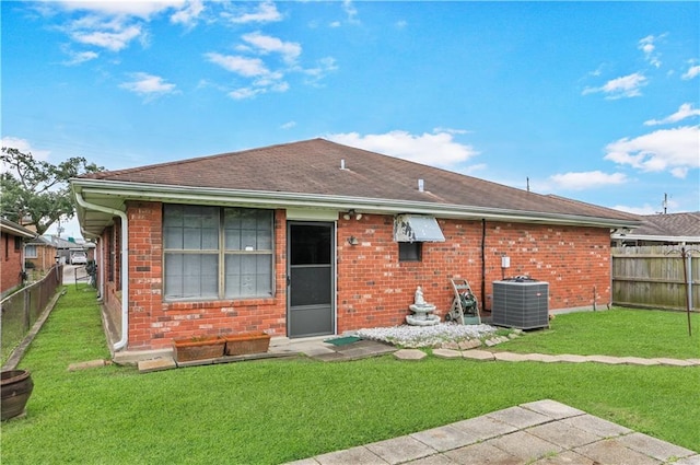 2820 Metairie Ct, Metairie, LA 70002 - rear view of house with brick siding and a shingled roof