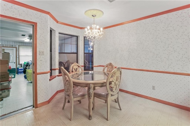 2820 Metairie Ct, Metairie, LA 70002 - dining area with wallpapered walls, tile patterned floors, ornamental molding, and a chandelier