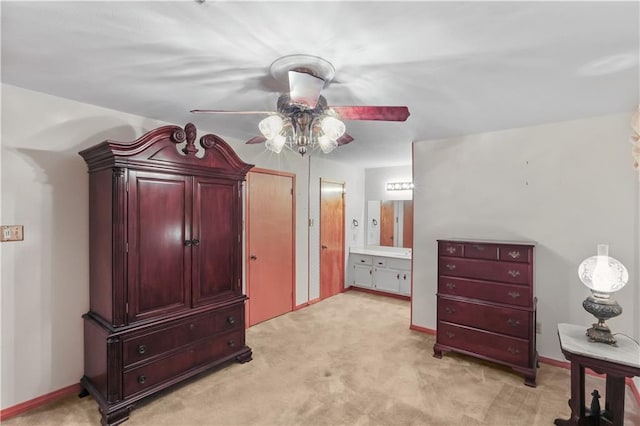 2820 Metairie Ct, Metairie, LA 70002 - bedroom with light carpet, ensuite bath, and ceiling fan