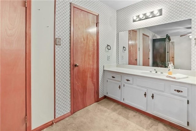 2820 Metairie Ct, Metairie, LA 70002 - bathroom featuring wallpapered walls and vanity