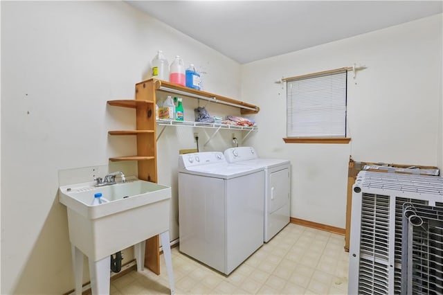 2820 Metairie Ct, Metairie, LA 70002 - laundry area featuring washing machine and clothes dryer and light floors