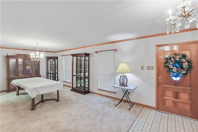 2820 Metairie Ct, Metairie, LA 70002 - entryway with a chandelier, light carpet, and crown molding