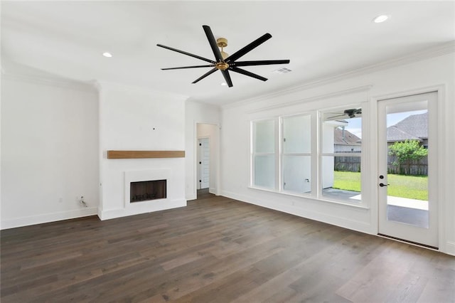 2025 White Dove Dr, Madisonville, LA 70447 - unfurnished living room with crown molding, wood finished floors, a fireplace, a ceiling fan, and recessed lighting