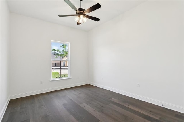 2025 White Dove Dr, Madisonville, LA 70447 - unfurnished room featuring dark wood-style flooring and a ceiling fan