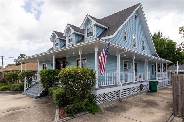 4525 Barnett St, Metairie, LA 70006 - farmhouse-style home with a porch