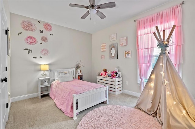 502 Terrace Lake Dr, Covington, LA 70435 - carpeted bedroom with baseboards and a ceiling fan