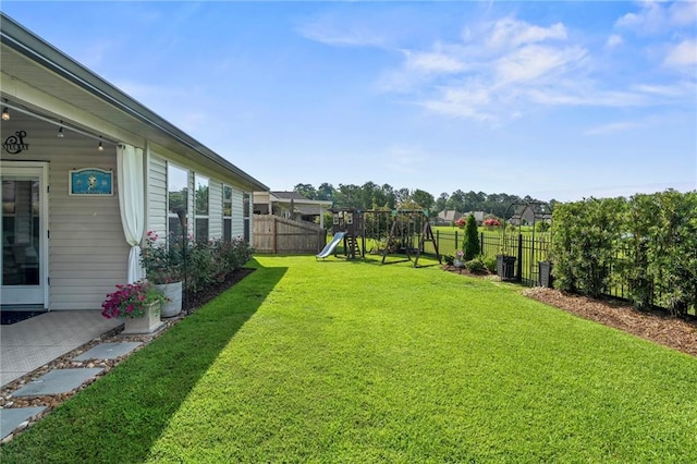 502 Terrace Lake Dr, Covington, LA 70435 - fenced backyard with a playground