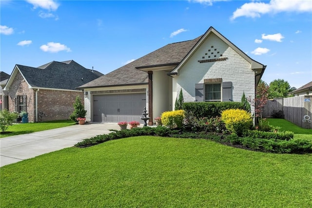 502 Terrace Lake Dr, Covington, LA 70435 - view of front of home with brick siding, a garage, driveway, and a shingled roof