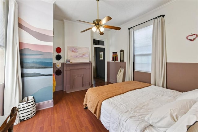2018 Adams St, New Orleans, LA 70118 - bedroom featuring wood finished floors, ornamental molding, and ceiling fan