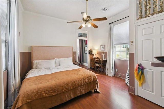2018 Adams St, New Orleans, LA 70118 - bedroom with wood finished floors, ornamental molding, and a ceiling fan