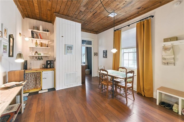 2018 Adams St, New Orleans, LA 70118 - dining space with wood ceiling and dark wood finished floors