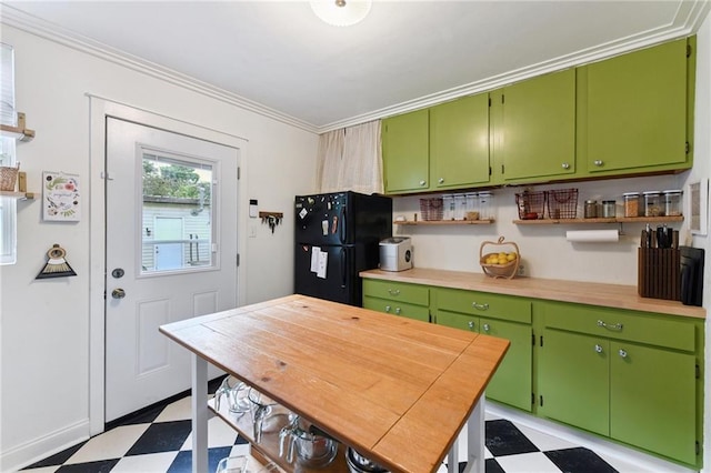 2018 Adams St, New Orleans, LA 70118 - kitchen featuring light flooring, freestanding refrigerator, open shelves, ornamental molding, and light countertops