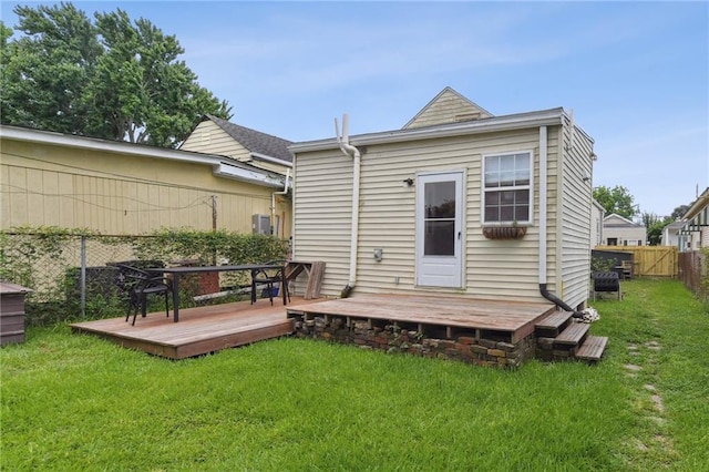 2018 Adams St, New Orleans, LA 70118 - back of property with a wooden deck