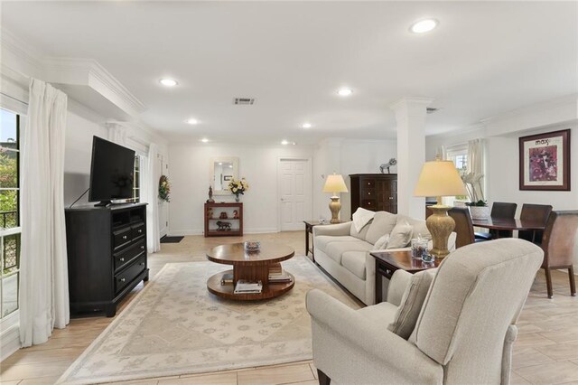 2521 Metairie Lawn Dr Unit 214, Metairie, LA 70002 - living area featuring decorative columns, recessed lighting, and crown molding