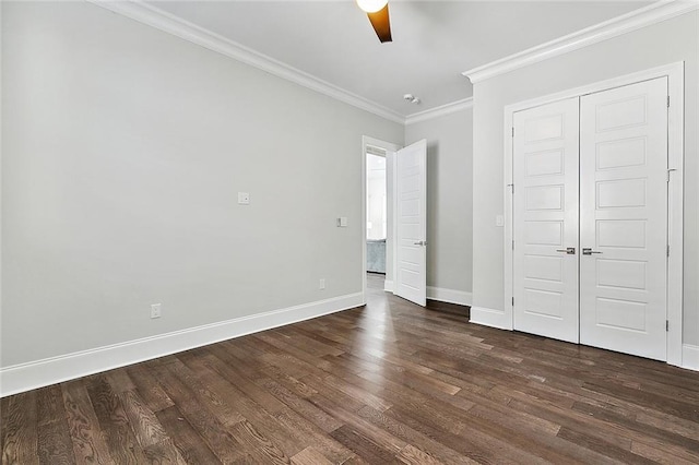 5502 Wilton Dr, New Orleans, LA 70122 - unfurnished bedroom featuring dark wood-type flooring, crown molding, a closet, and a ceiling fan
