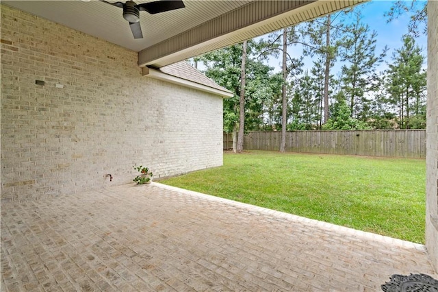 4028 Cypress Point Dr, Covington, LA 70433 - fenced backyard featuring a ceiling fan and a patio
