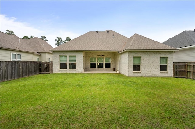 4028 Cypress Point Dr, Covington, LA 70433 - rear view of house featuring a fenced backyard, a ceiling fan, a patio area, a gate, and roof with shingles