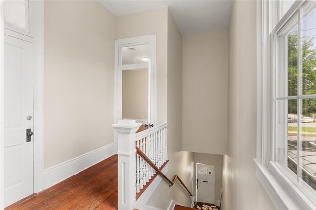 4149-51 Canal St, New Orleans, LA 70119 - hallway with an upstairs landing and dark wood-style flooring