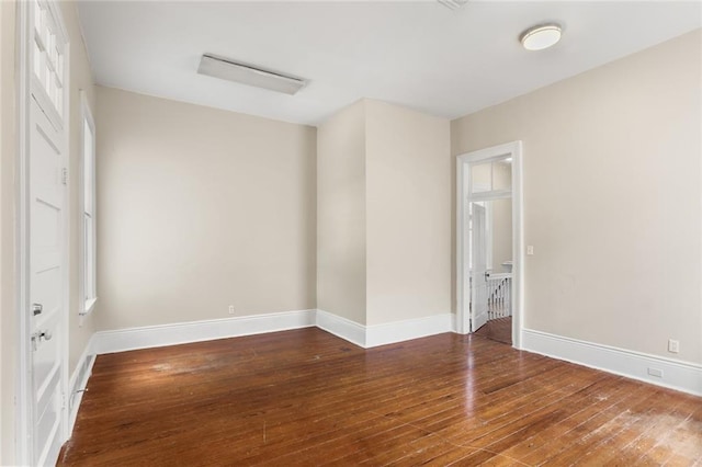 4149-51 Canal St, New Orleans, LA 70119 - spare room featuring hardwood / wood-style flooring and baseboards