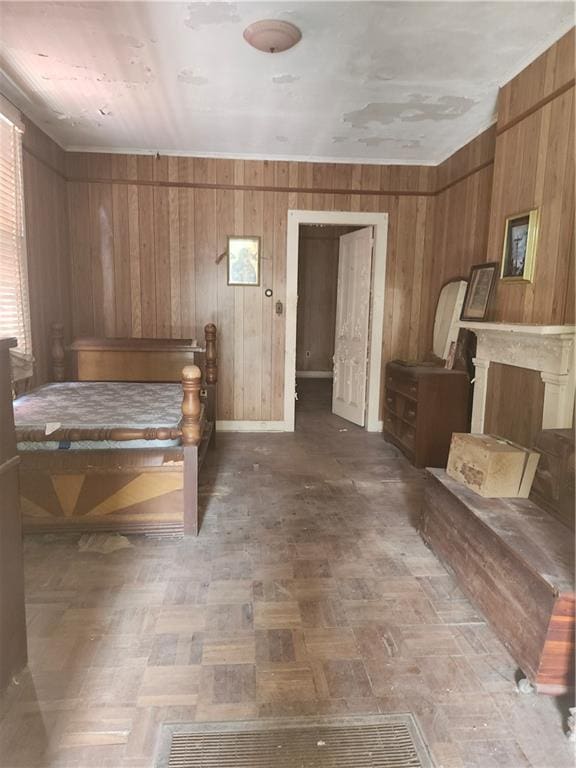 727 Montegut St, New Orleans, LA 70117 - bedroom featuring wood walls