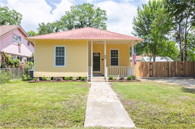 2970 College St, Slidell, LA 70458 - bungalow-style home with a porch, a metal roof, and a gate