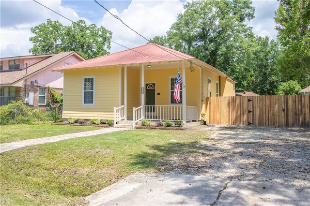 2970 College St, Slidell, LA 70458 - bungalow featuring a gate and a metal roof