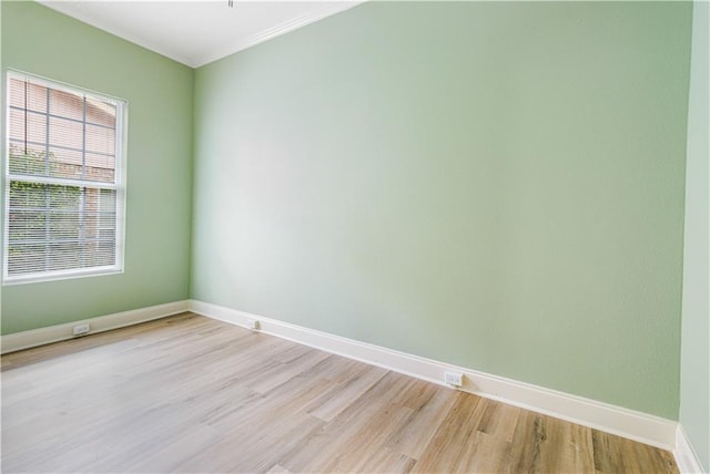 2970 College St, Slidell, LA 70458 - empty room featuring light wood-type flooring and ornamental molding