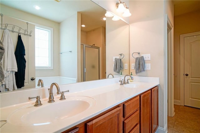 626 Bellingrath Ln, Slidell, LA 70458 - bathroom featuring a shower stall, tile patterned floors, double vanity, and a garden tub
