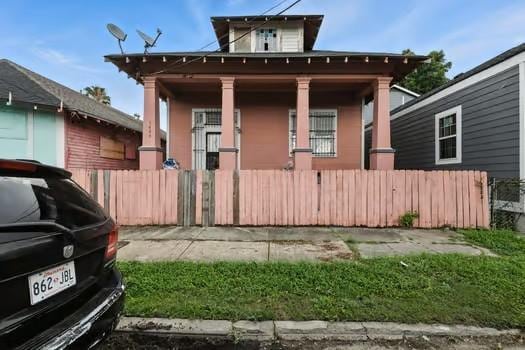 1635 Frenchmen St, New Orleans, LA 70116 - view of front of home with a porch