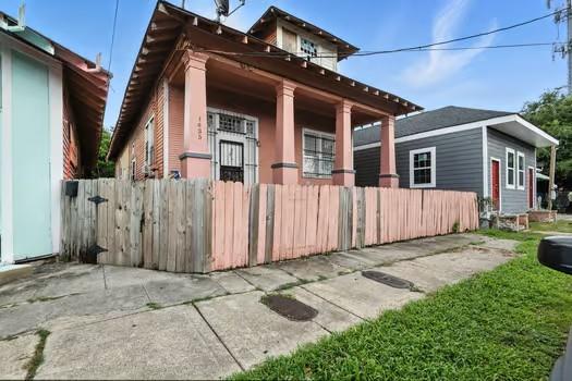 1635 Frenchmen St, New Orleans, LA 70116 - view of home's exterior with covered porch