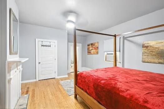 1635 Frenchmen St, New Orleans, LA 70116 - bedroom featuring light wood-type flooring and baseboards