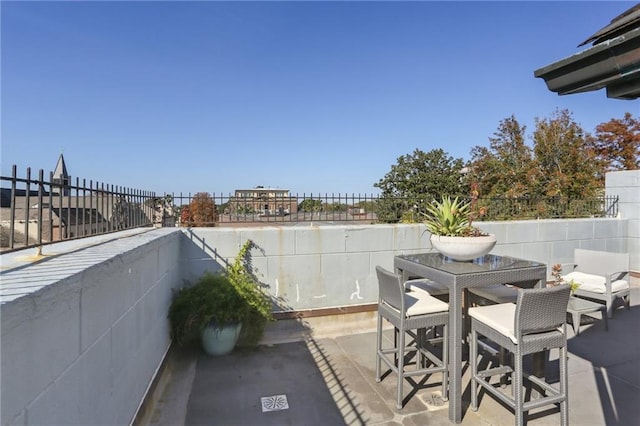 1303 Burgundy St Unit 14, New Orleans, LA 70116 - view of patio featuring outdoor dining space