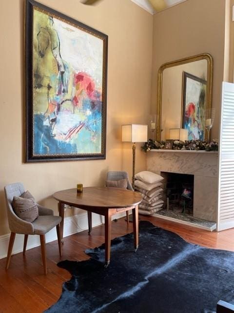 740 Esplanade Ave Unit 3, New Orleans, LA 70116 - sitting room with wood finished floors and a premium fireplace