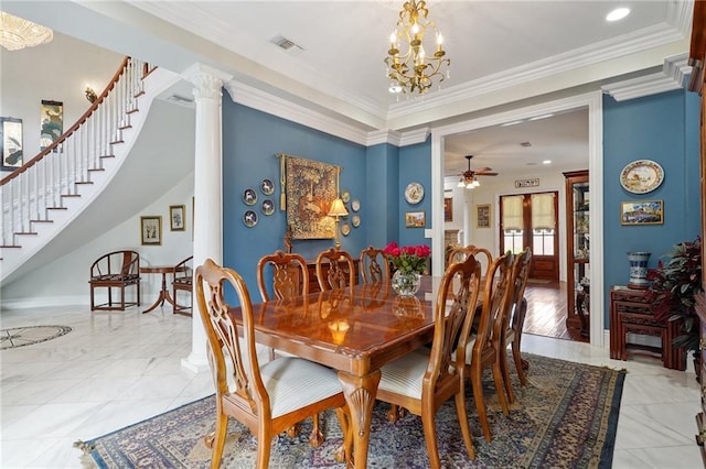 712 Stewart Ave, River Ridge, LA 70123 - dining room featuring stairway, a chandelier, ceiling fan, decorative columns, and ornamental molding