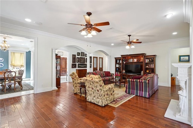 712 Stewart Ave, River Ridge, LA 70123 - living room featuring arched walkways, ceiling fan, dark wood finished floors, recessed lighting, and ornamental molding
