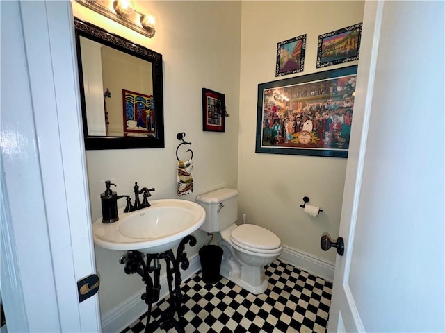 712 Stewart Ave, River Ridge, LA 70123 - bathroom with toilet and tile patterned floors