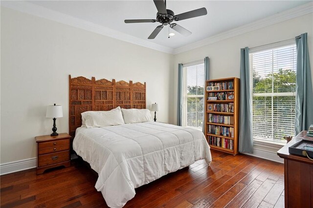 712 Stewart Ave, River Ridge, LA 70123 - bedroom featuring hardwood / wood-style floors, ornamental molding, and a ceiling fan