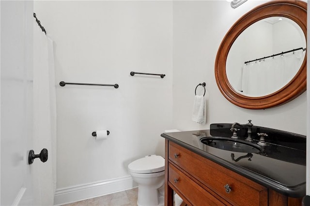712 Stewart Ave, River Ridge, LA 70123 - full bath with vanity, tile patterned flooring, and a shower with curtain