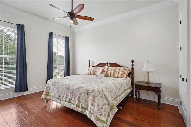 712 Stewart Ave, River Ridge, LA 70123 - bedroom with dark wood-style flooring, ornamental molding, and ceiling fan