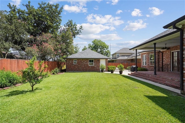 712 Stewart Ave, River Ridge, LA 70123 - fenced backyard with a patio and ceiling fan