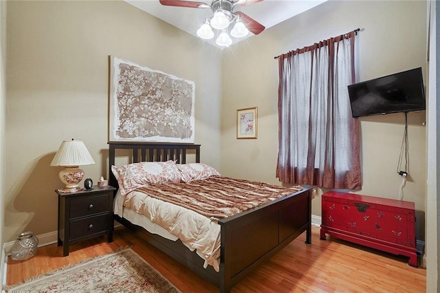 215 N Rendon St, New Orleans, LA 70119 - bedroom featuring wood finished floors and a ceiling fan