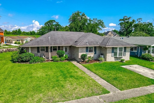 42 Hennessey Ct, River Ridge, LA 70123 - single story home with a front yard and roof with shingles