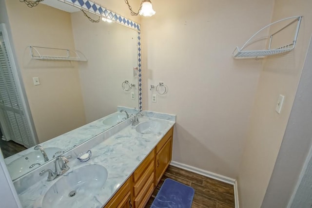 42 Hennessey Ct, River Ridge, LA 70123 - full bathroom featuring wood finished floors and double vanity