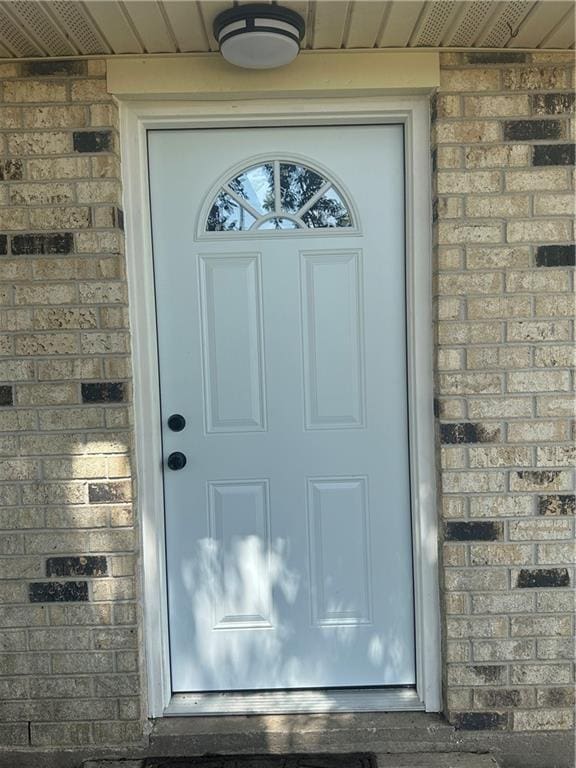 2012 S Sugar Ridge Rd, La Place, LA 70068 - view of exterior entry featuring brick siding