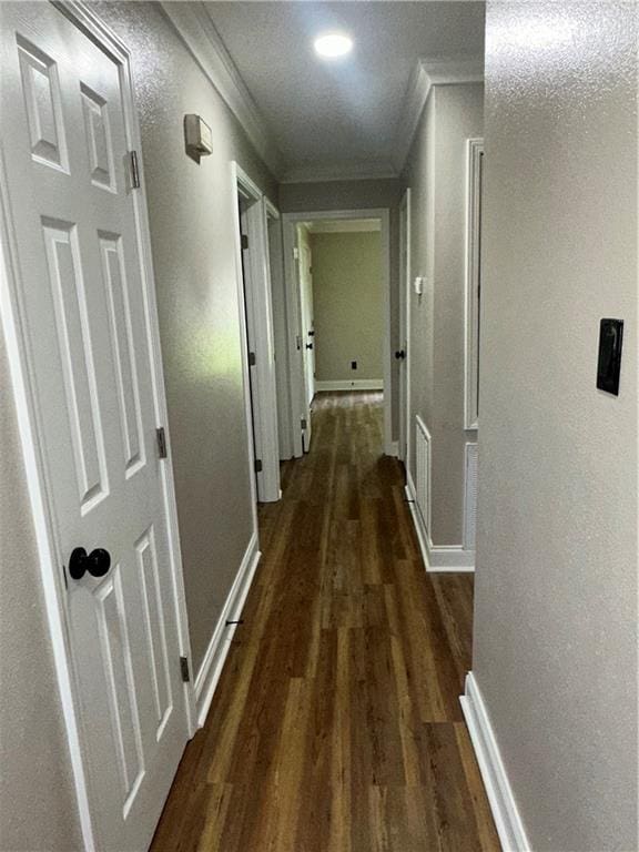 2012 S Sugar Ridge Rd, La Place, LA 70068 - hall featuring crown molding and dark wood-type flooring