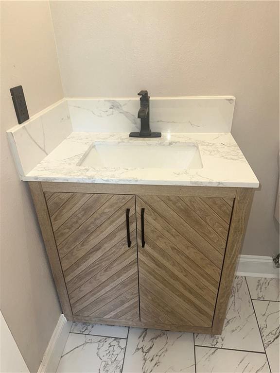 2012 S Sugar Ridge Rd, La Place, LA 70068 - bathroom view of vanity and baseboards