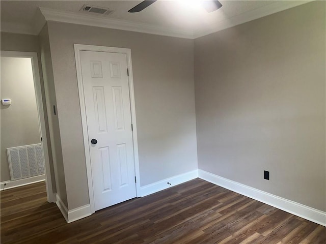 2012 S Sugar Ridge Rd, La Place, LA 70068 - unfurnished bedroom with crown molding, dark wood-style flooring, and ceiling fan